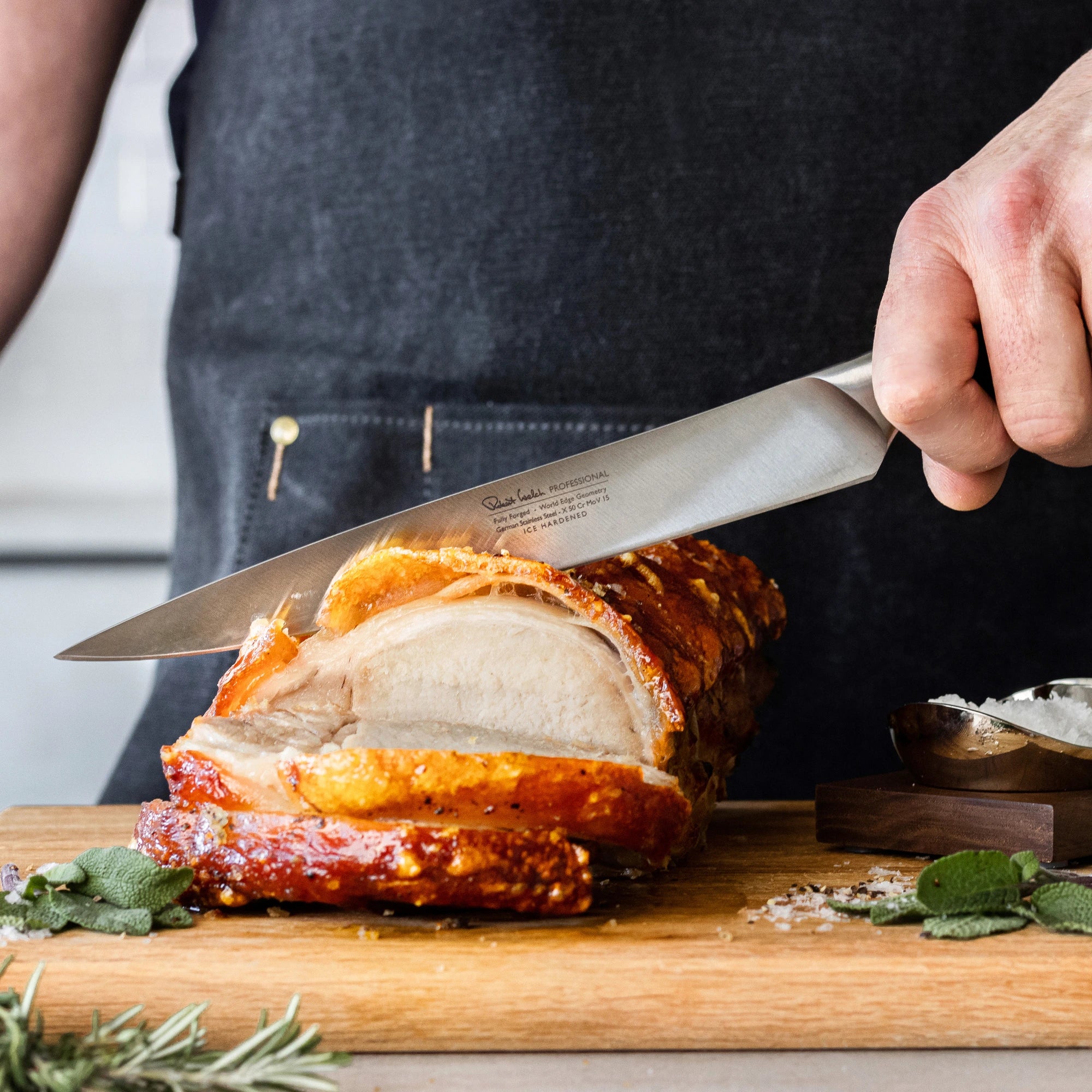 Robert Welch carving knife slicing through food