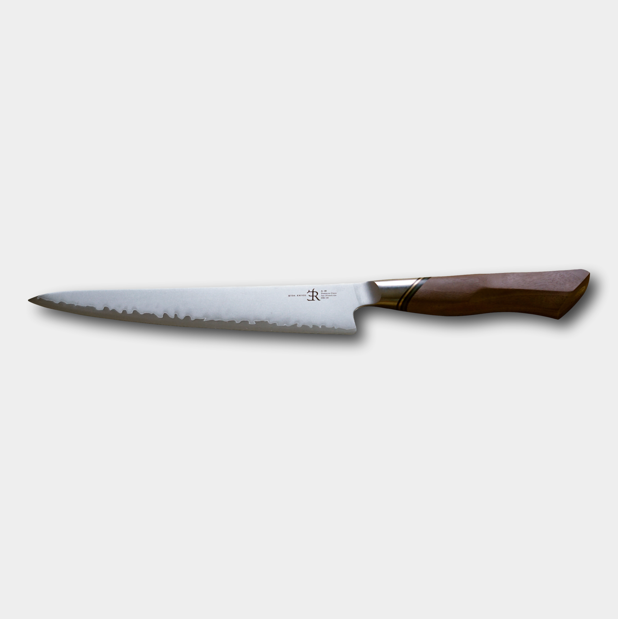 Ryda Knives A30 Carving knife. 3ply special steel blade with ultimate comfort handle. Supplied by cotswoldknifecompany.co.uk