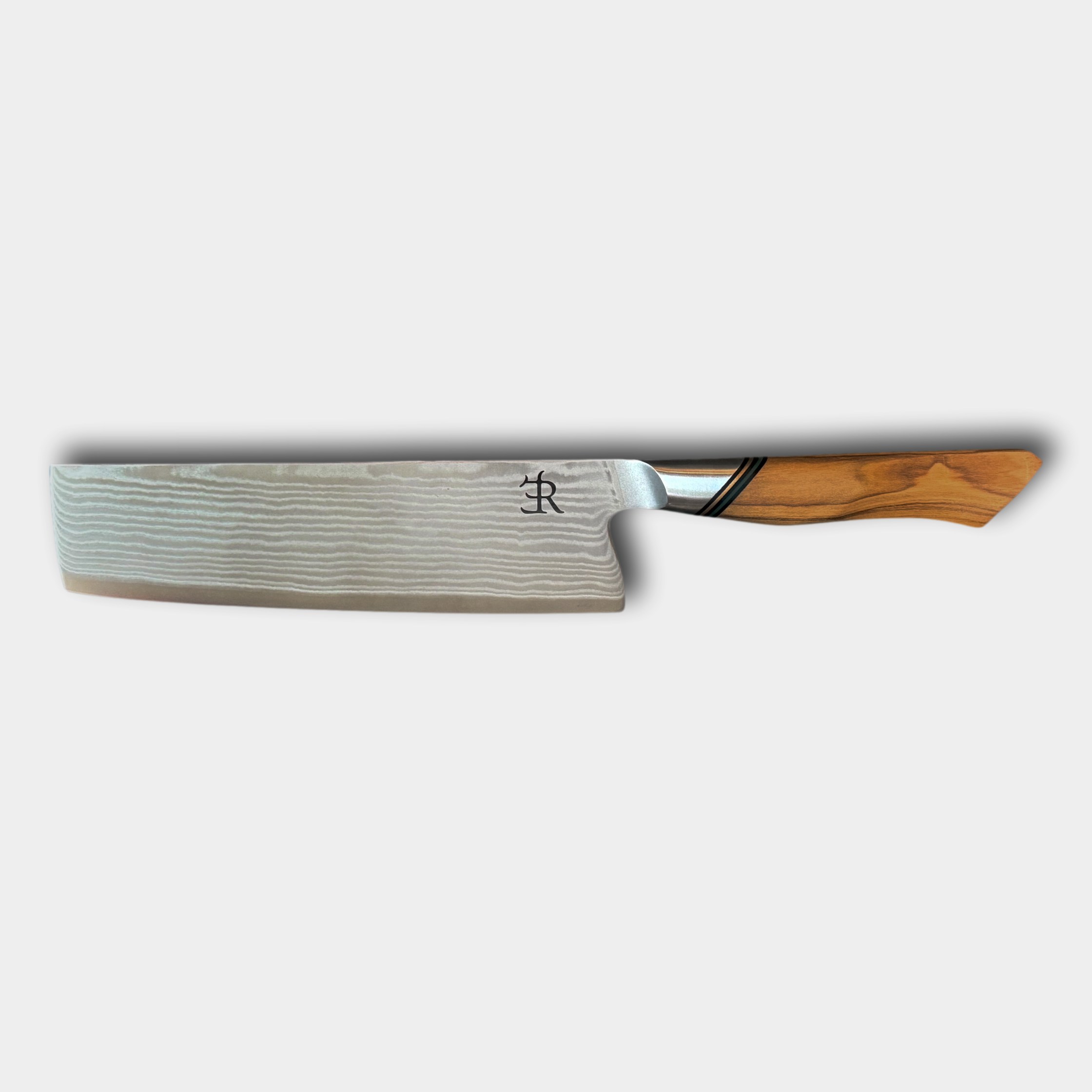 Ryda Knives from Sweden. A73 Nakiri knife, Damascus blade with ultimate comfort French Olivewood handle. Supplied by The Cotswold Knife Company.