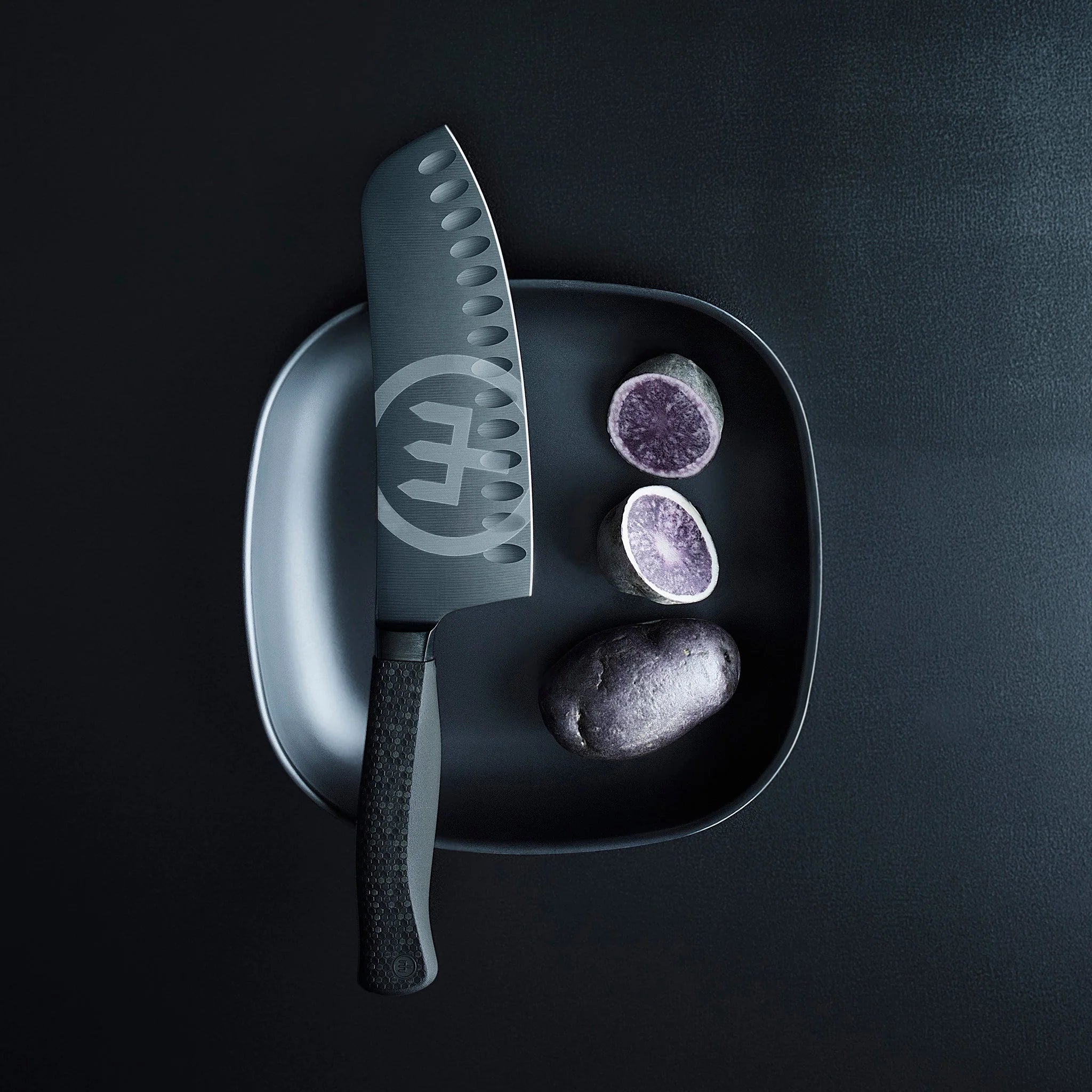 Wusthof Perfomer 17cm Rotoku knife with diamond like carbon coating and honeycombe handle by The Cotswold Knife Company