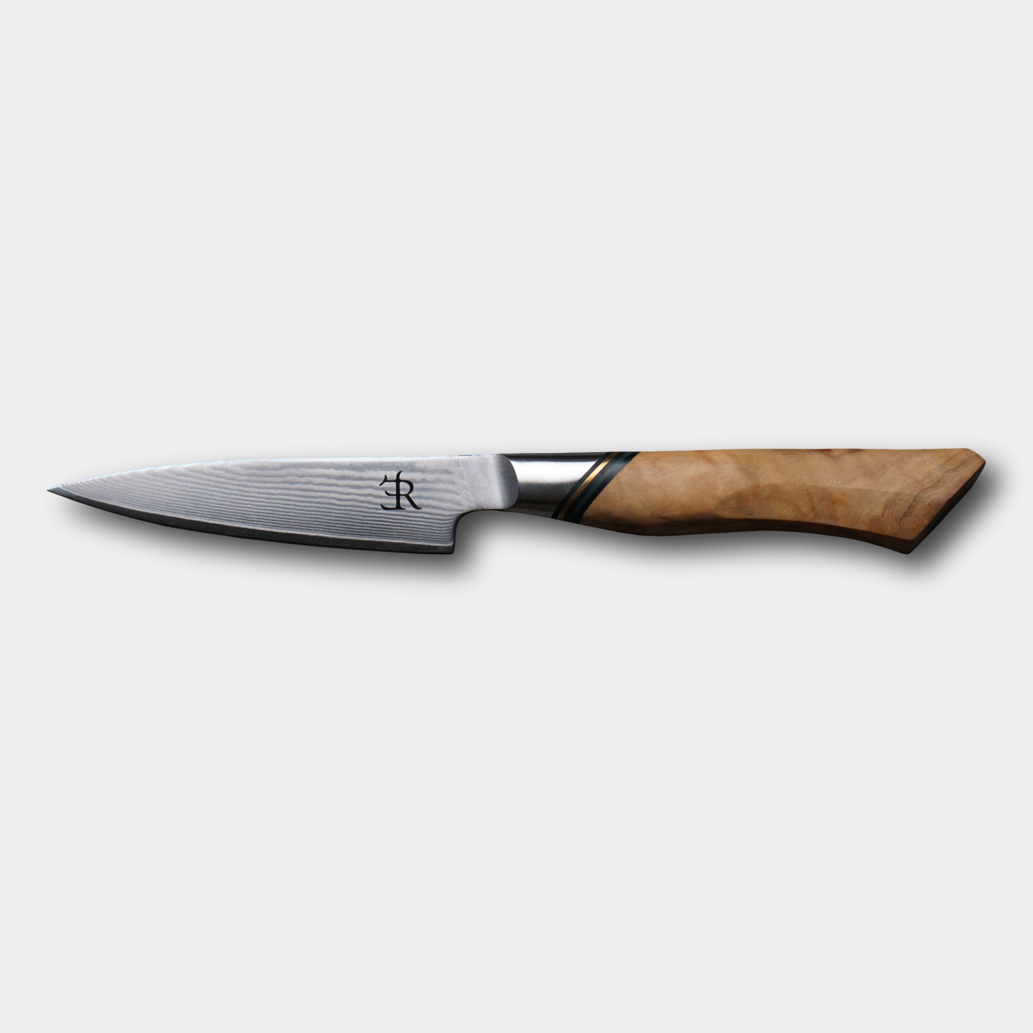 Ryda Knives from Sweden.  A73 Paring knife, Damascus blade with ultimate comfort French Olivewood handle.  Supplied by The Cotswold Knife Company.